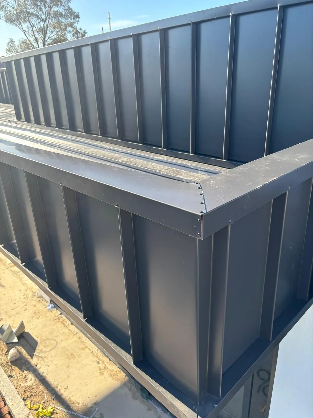 Box gutter and cladding detailing