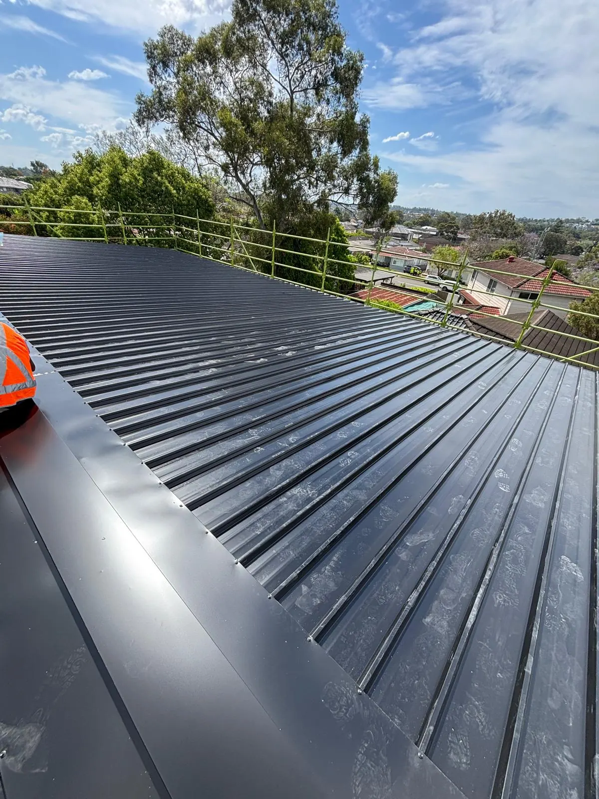 COLORBOND roof sheet installation in progress