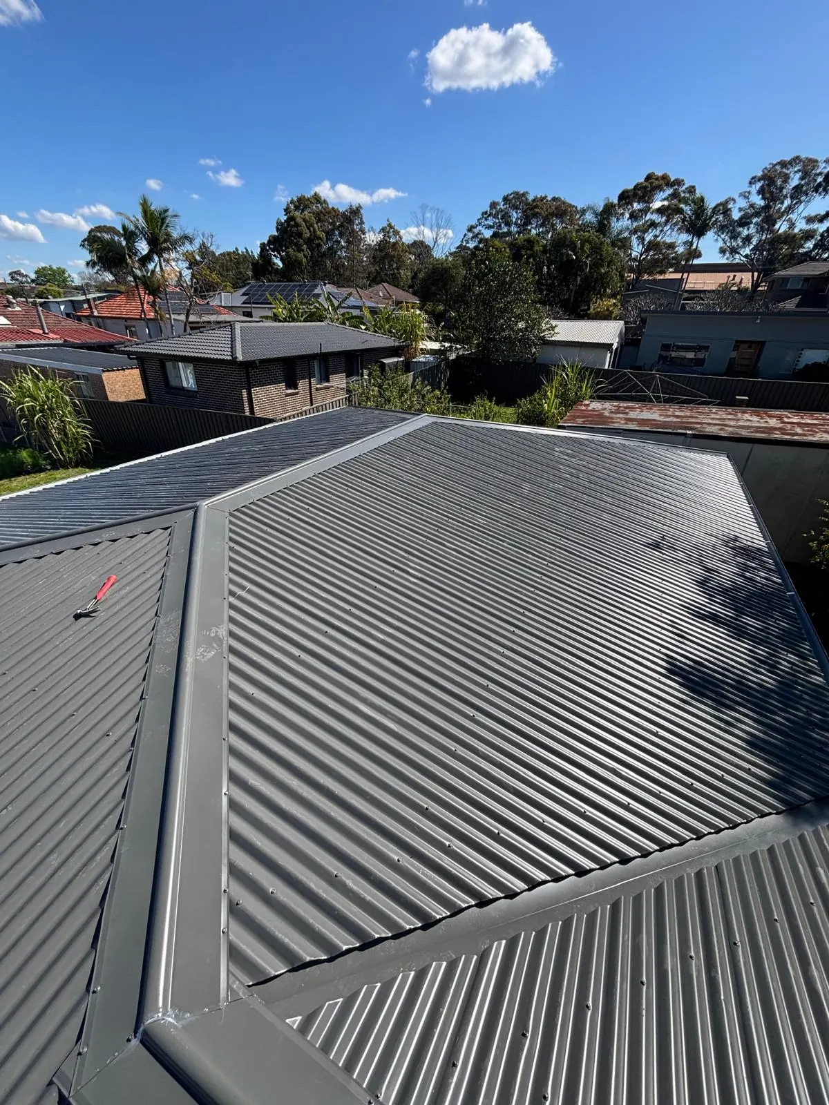 Dark COLORBOND residential roof installation