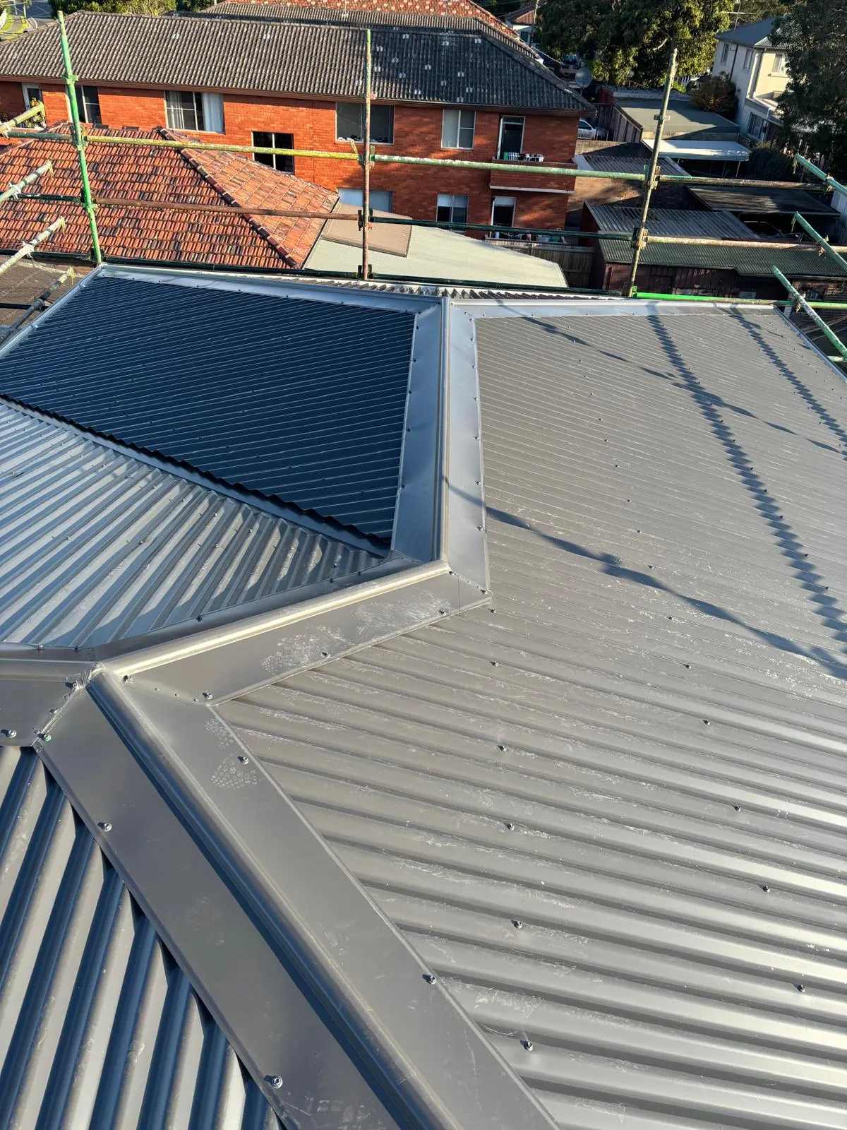 Metal roof ridge and flashing detail