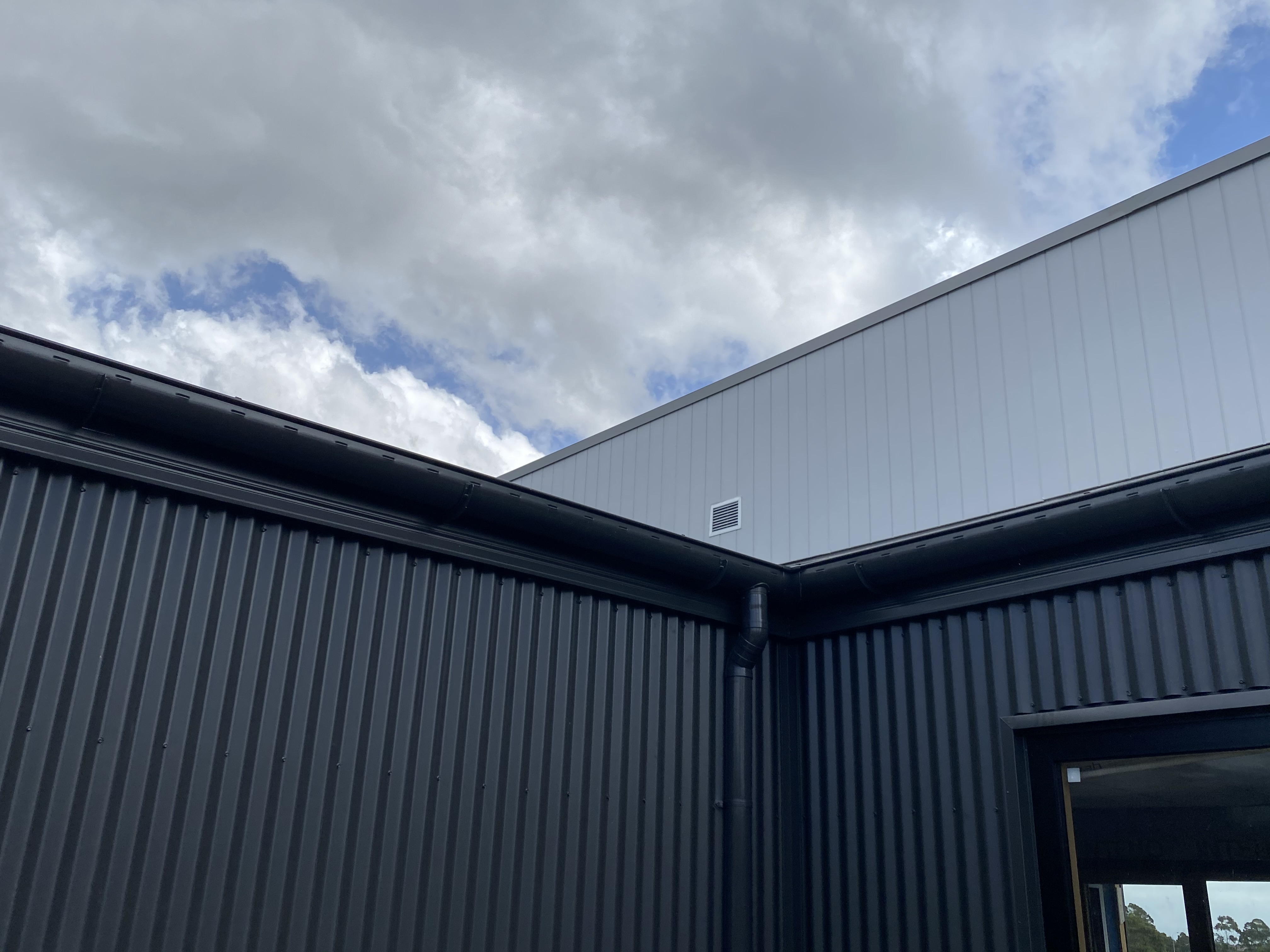 Wall cladding and gutters on a Sydney property - Senfix Roofing